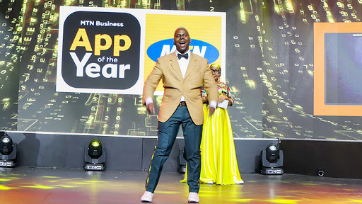 Sne Dladla, the night's MC, and Louisa Kodisang from MTN SA.